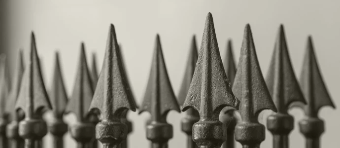 Iron points on the top of a fence