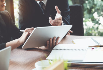Business woman discussing a case with a litigation attorney